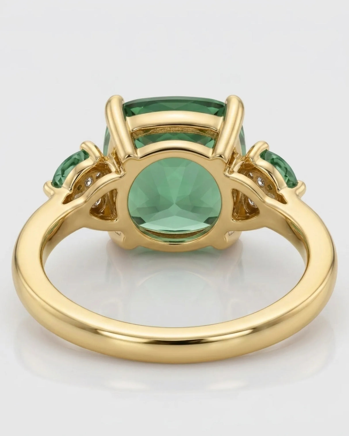 Luxury green tourmaline and diamond ring in yellow gold with romantic three-stone design | SARATTI