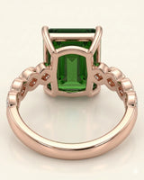 Luxury green tourmaline ring with diamond-set geometric band in rose gold | SARATTI