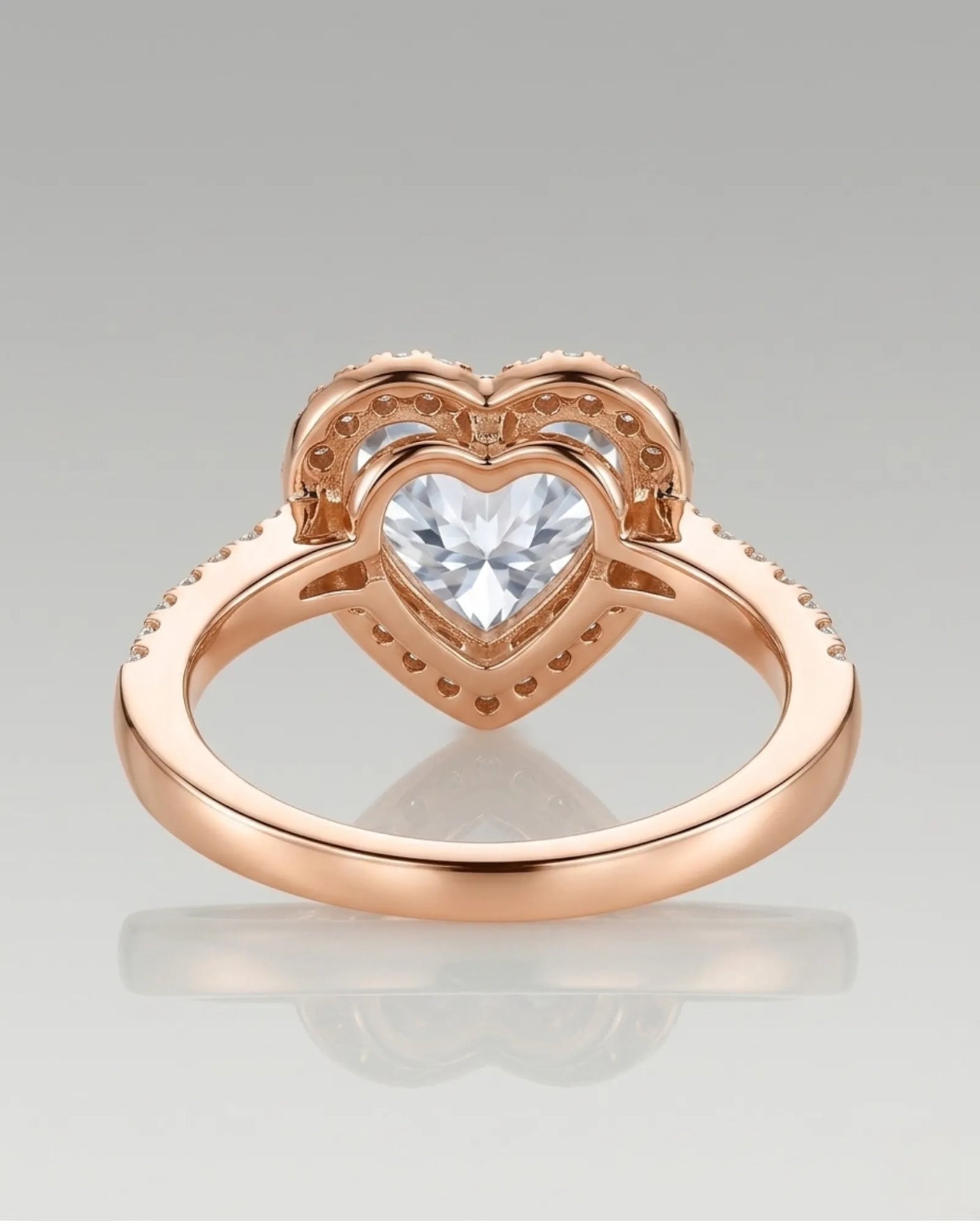 Luxury heart moissanite engagement ring with brilliant halo and refined 18K rose gold craftsmanship - SARATTI