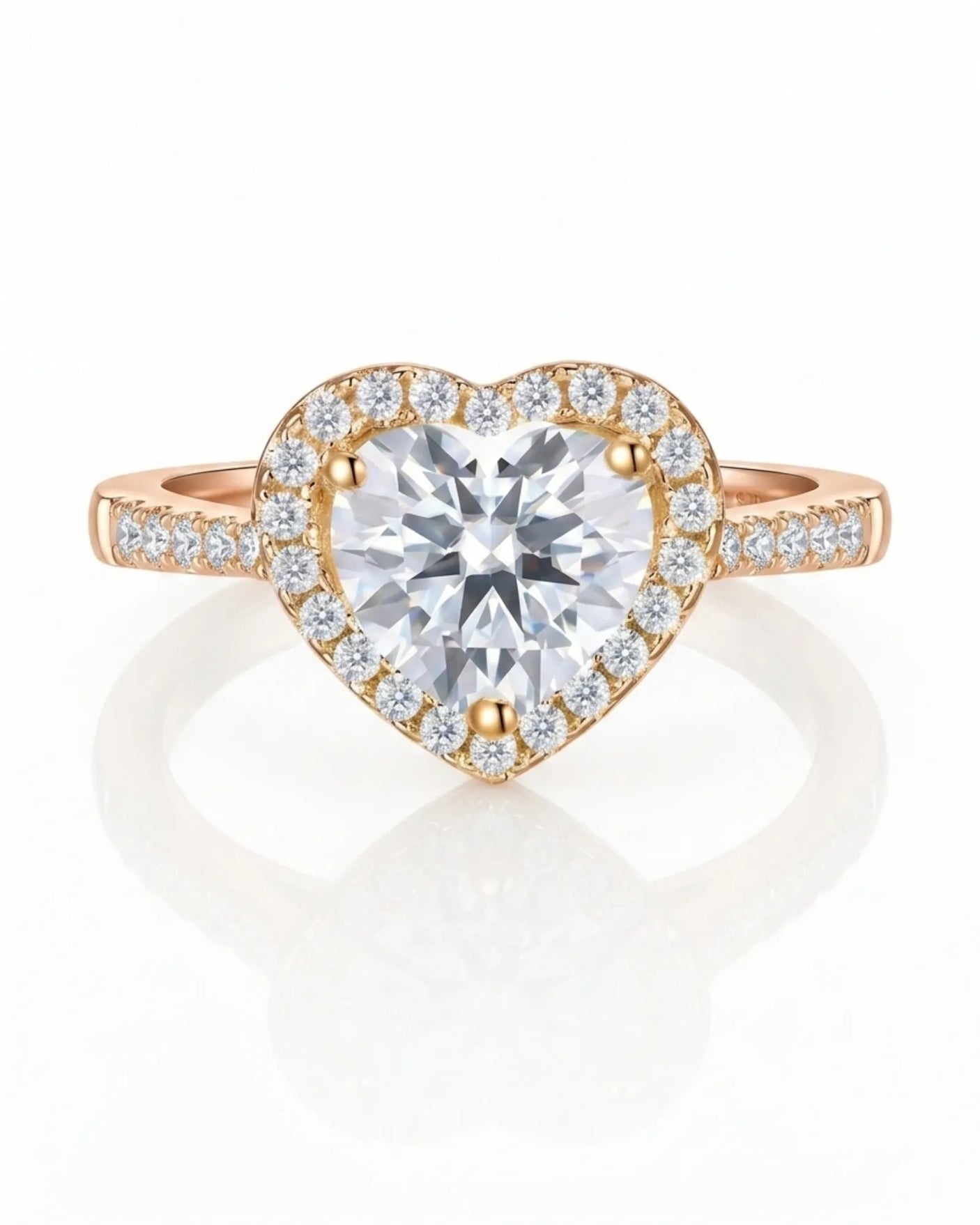 Luxury heart moissanite engagement ring with brilliant halo and refined 18K rose gold craftsmanship | SARATTI
