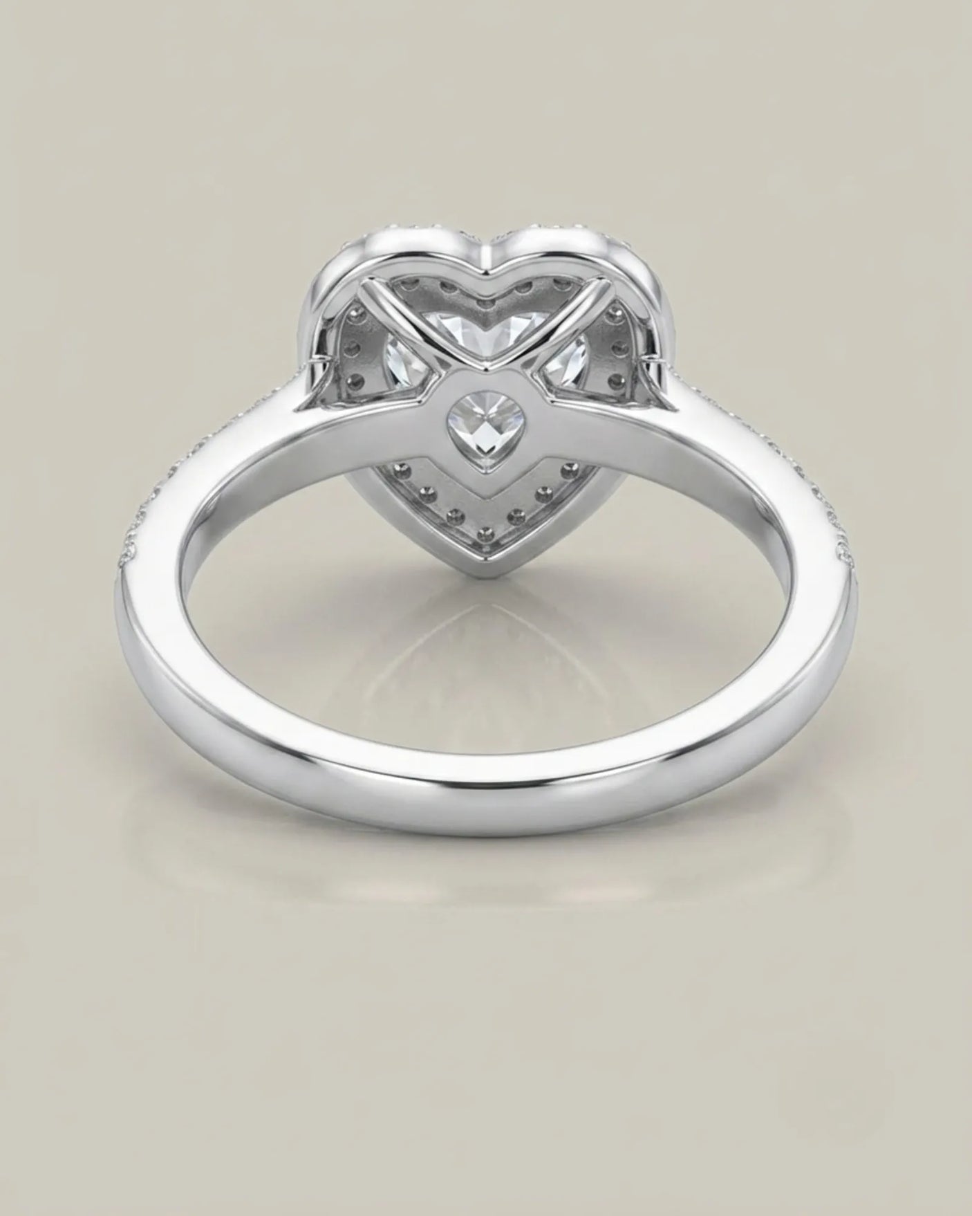 Luxury heart shaped moissanite ring with halo side stones in platinum | SARATTI