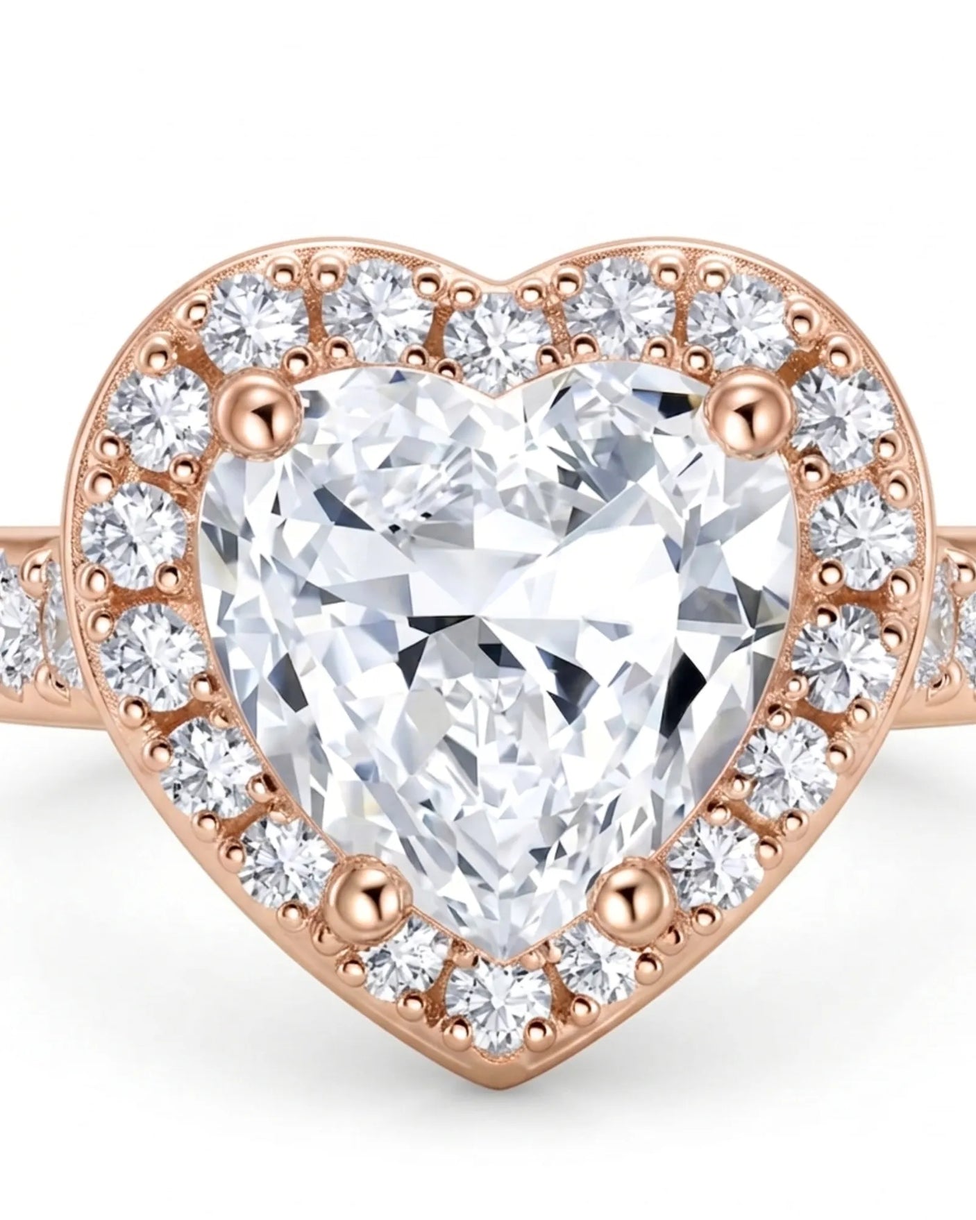 Luxury heart shaped moissanite ring with halo side stones in rose gold | SARATTI