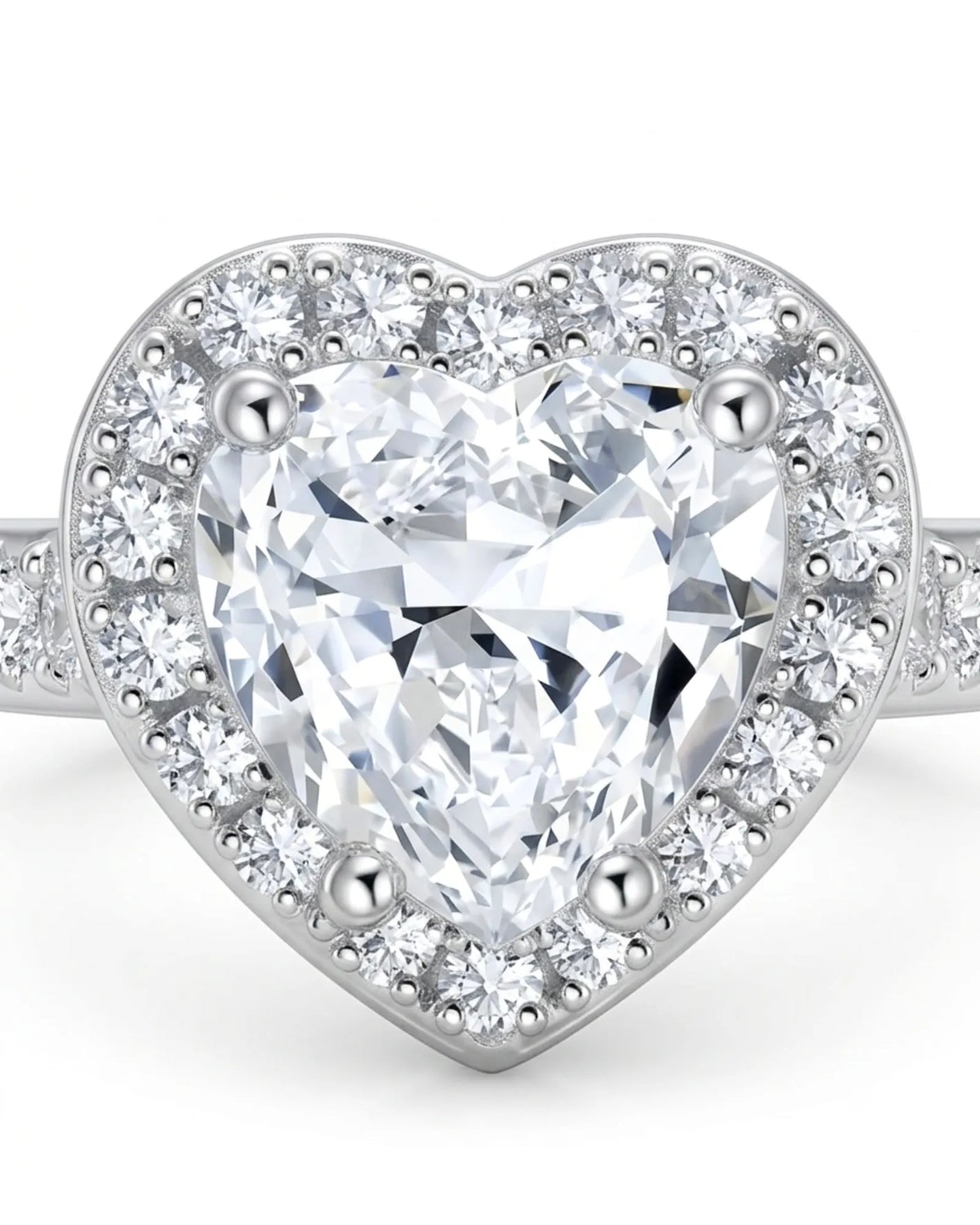Luxury heart shaped moissanite ring with halo side stones in white gold | SARATTI