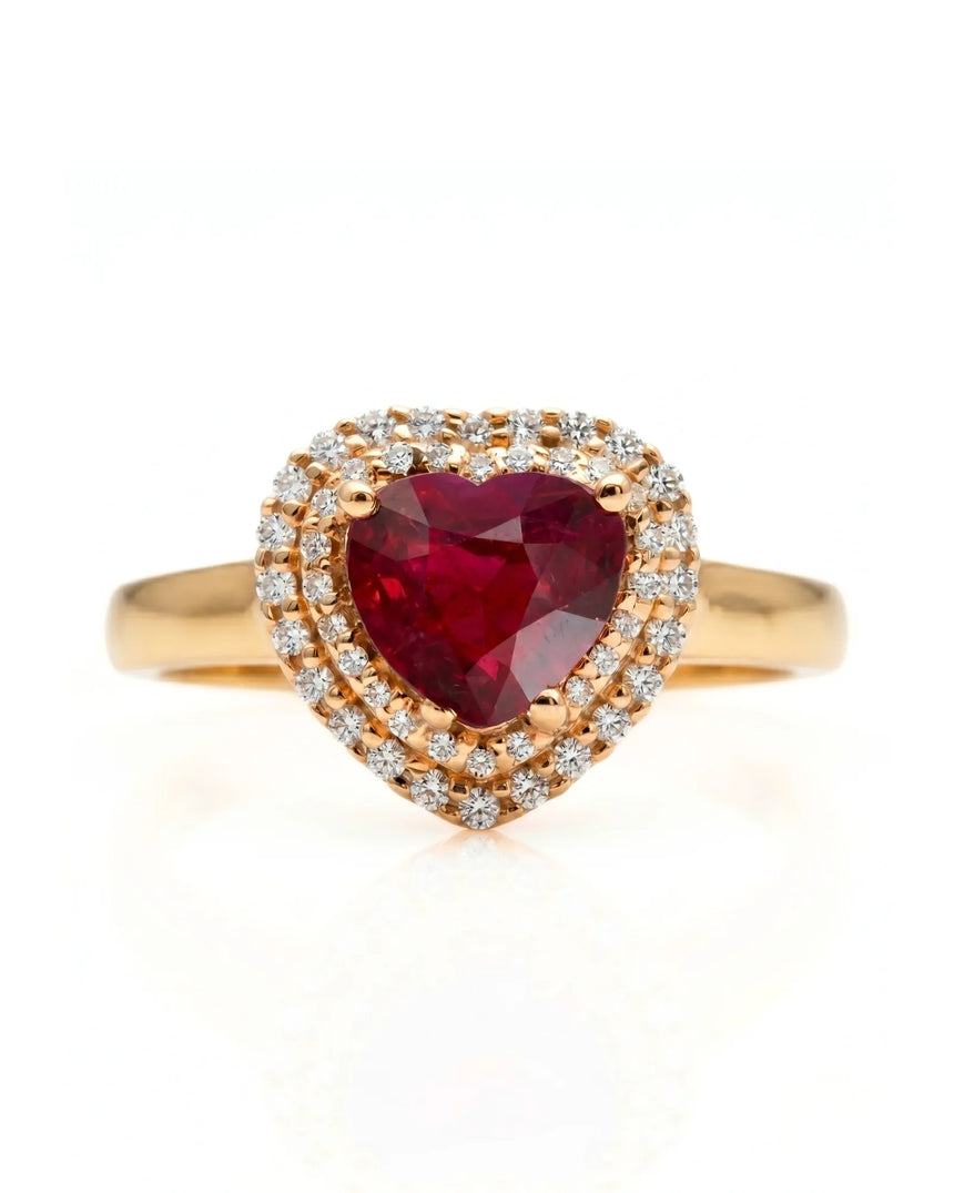 Luxury heart shaped ruby ring with double halo in refined yellow gold | SARATTI