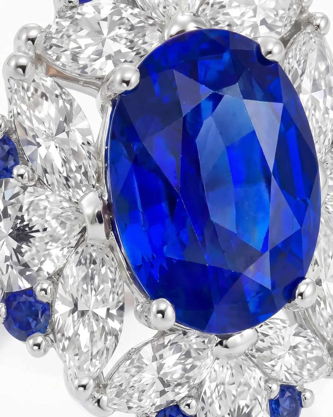Luxury high jewelry sapphire ring with floral diamond crown in 18K white gold - SARATTI
