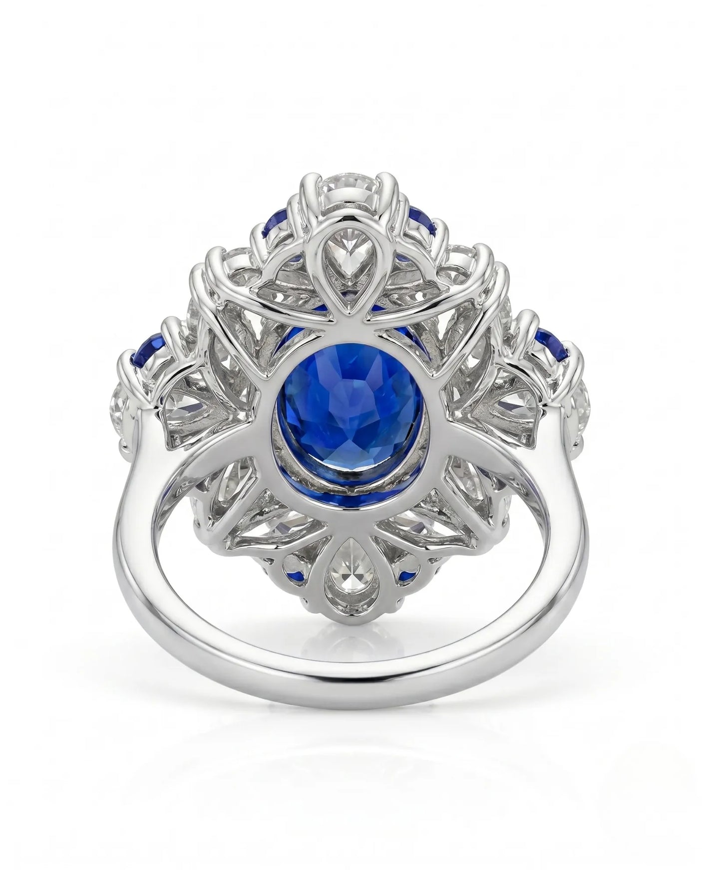 Luxury high jewelry sapphire ring with floral diamond crown in 18K white gold | SARATTI