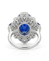 Luxury high jewelry sapphire ring with floral diamond crown in 18K white gold | SARATTI