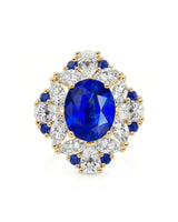 Luxury high jewelry sapphire ring with warm diamond crown in 18K yellow gold | SARATTI