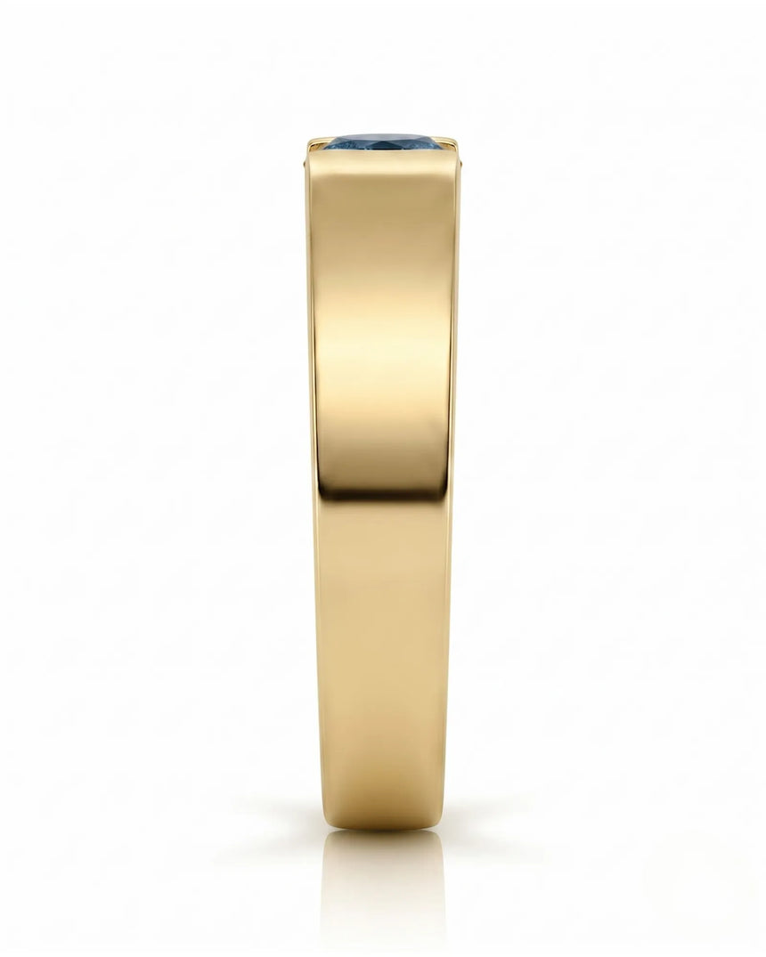 Luxury men’s ring with tension-set blue diamond and substantial 18K yellow gold profile - SARATTI