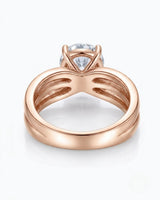 Luxury moissanite engagement ring with floating centre and refined 18K rose gold craftsmanship - SARATTI