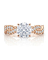 Luxury moissanite solitaire ring with interwoven pavé detailing and 18K rose gold craftsmanship | SARATTI