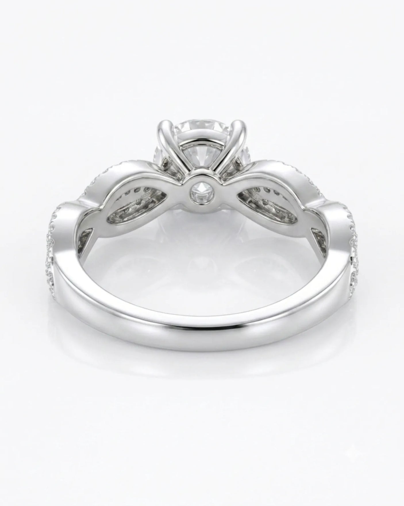 Luxury moissanite solitaire ring with interwoven pavé detailing and 18K white gold craftsmanship - SARATTI
