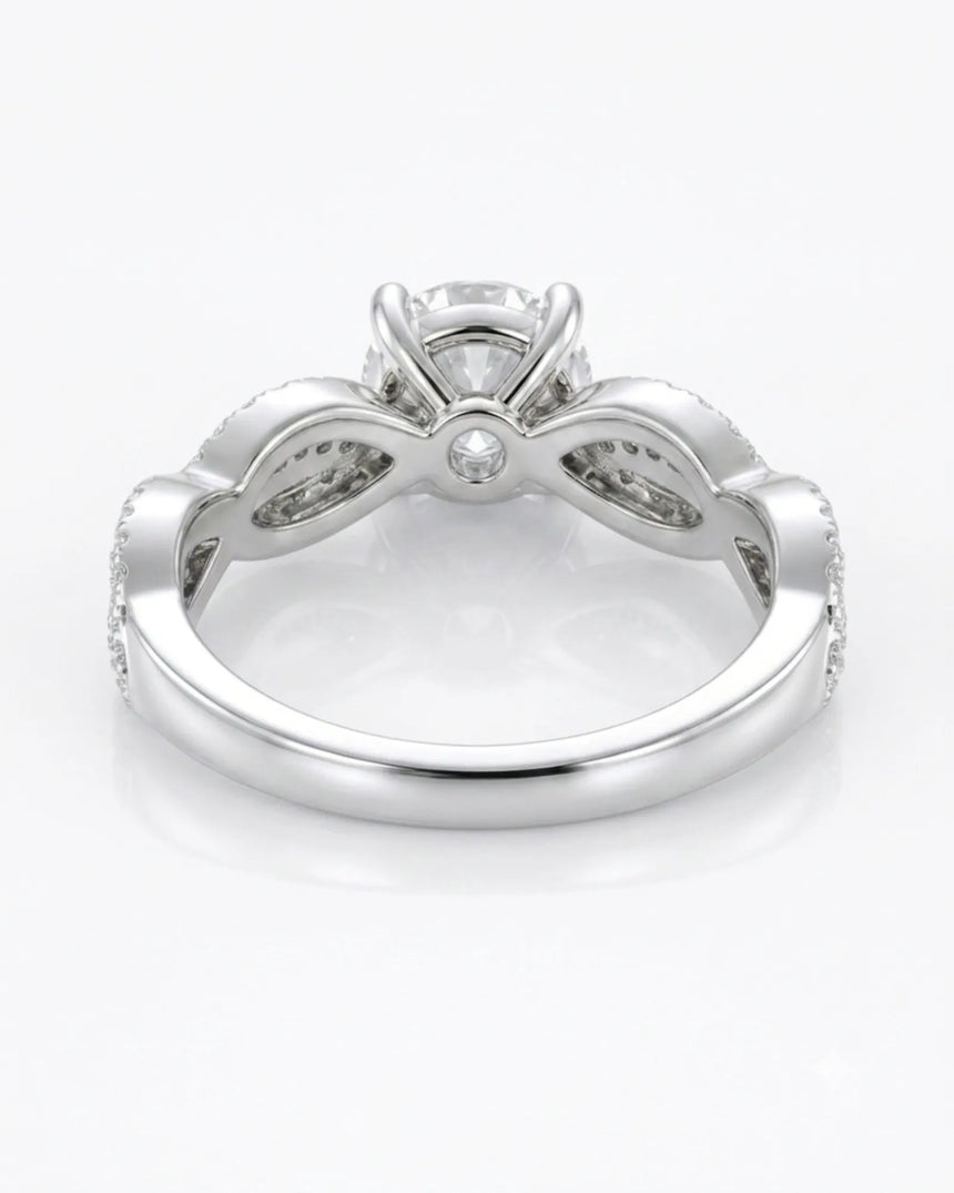Luxury moissanite solitaire ring with interwoven pavé detailing and 18K white gold craftsmanship - SARATTI