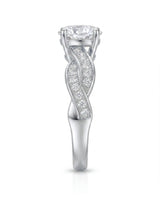 Luxury moissanite solitaire ring with interwoven pavé detailing and 18K white gold craftsmanship | SARATTI