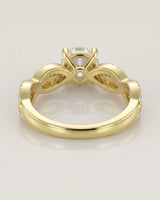 Luxury moissanite solitaire ring with interwoven pavé detailing and 18K yellow gold craftsmanship - SARATTI