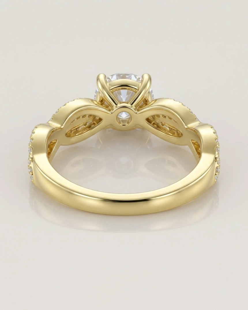 Luxury moissanite solitaire ring with interwoven pavé detailing and 18K yellow gold craftsmanship - SARATTI
