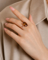 Luxury natural Imperial Topaz statement ring with oval solitaire design in premium 18K rose gold | SARATTI