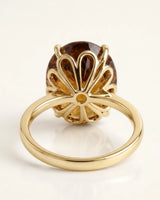 Luxury natural Imperial Topaz statement ring with oval solitaire design in premium 18K yellow gold | SARATTI