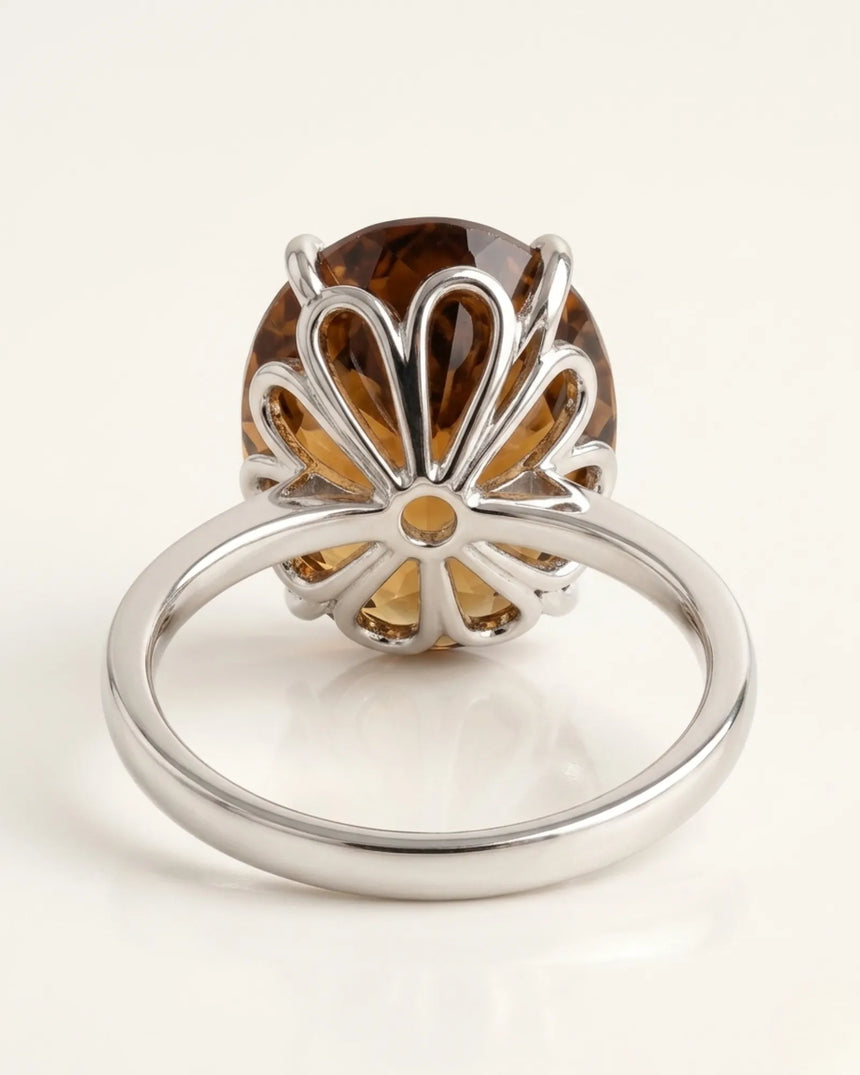 Luxury natural Imperial Topaz statement ring with oval solitaire design in premium platinum | SARATTI