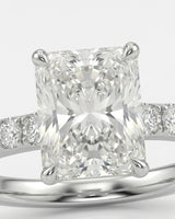Luxury natural diamond engagement ring with radiant centre and pavé-set platinum band | SARATTI