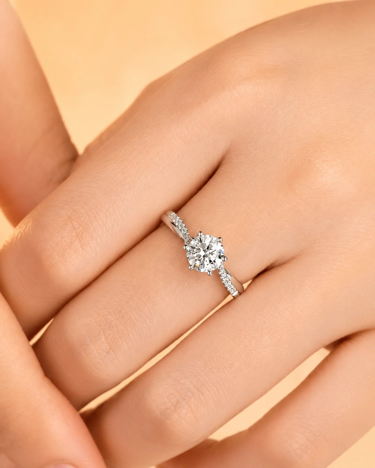 Luxury natural diamond ring with round center stone and refined white gold pavé band | SARATTI