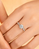 Luxury natural diamond ring with round center stone and refined white gold pavé band | SARATTI
