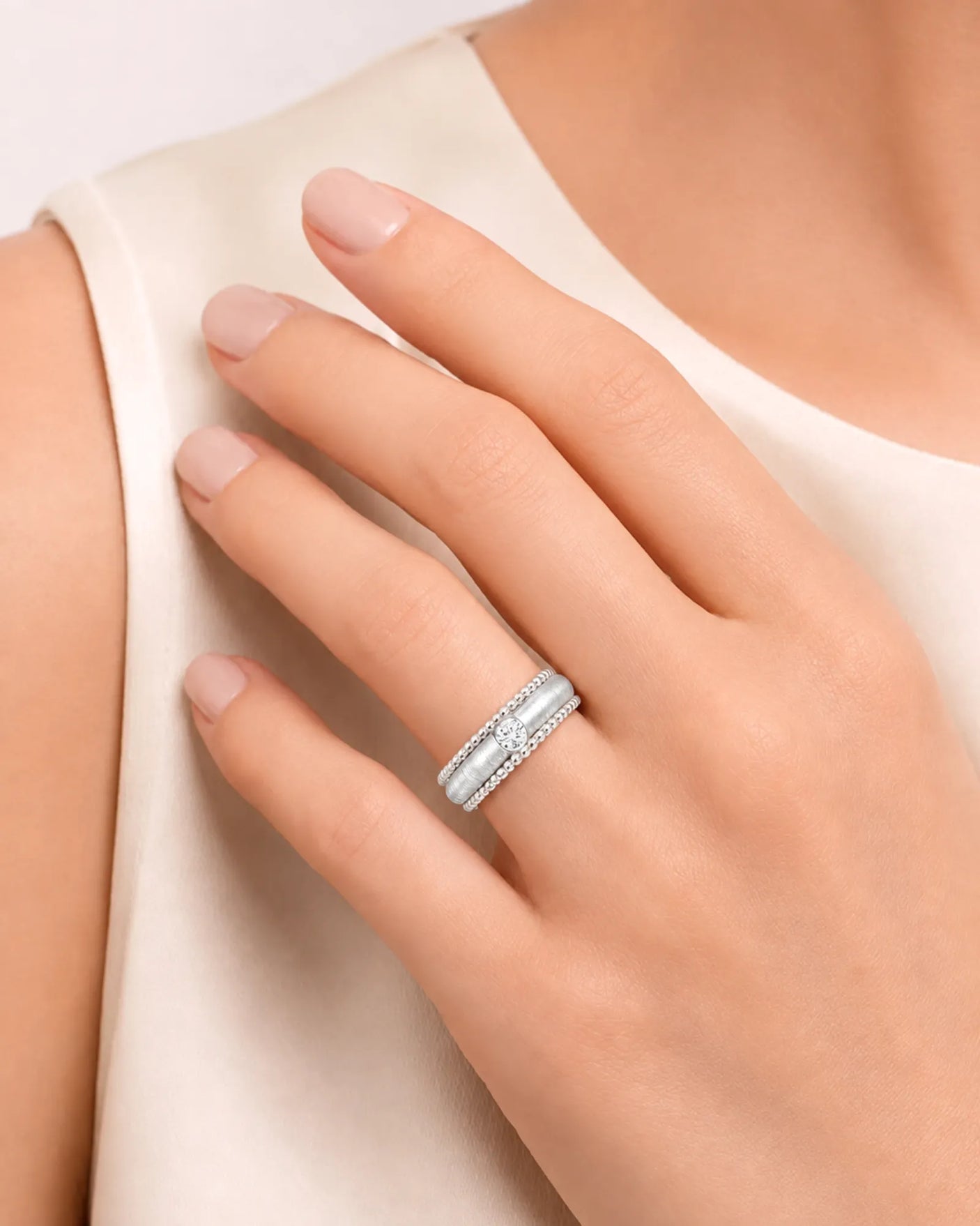 Luxury natural diamond wedding ring with distinctive textured detailing and refined platinum craftsmanship | SARATTI
