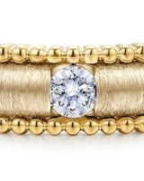 Luxury natural diamond wedding ring with distinctive textured detailing crafted in rich 18K yellow gold | SARATTI