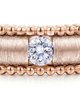 Luxury natural diamond wedding ring with distinctive textured detailing crafted in warm 18K rose gold | SARATTI