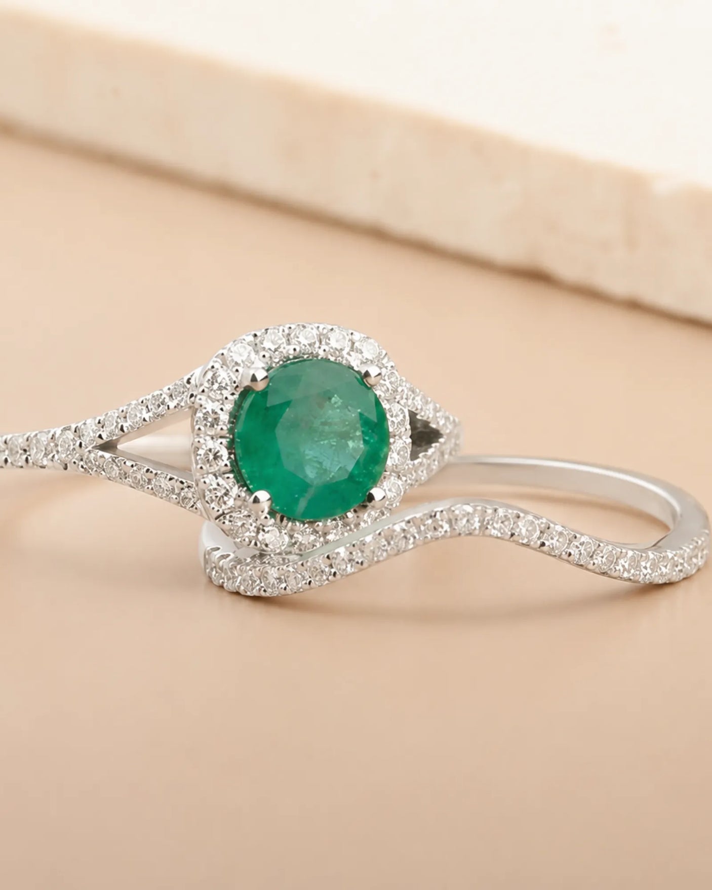 Luxury natural emerald bridal set with moissanite split-shank detailing in white gold | SARATTI.