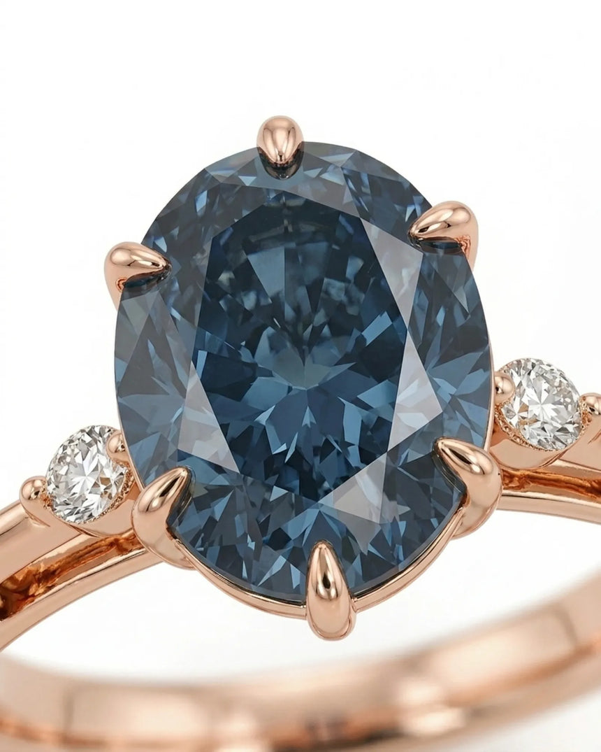 Luxury oval blue moissanite ring with accent stones and warm rose gold finish - SARATTI