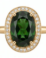 Luxury oval green tourmaline ring with diamond halo in 18K yellow gold | SARATTI