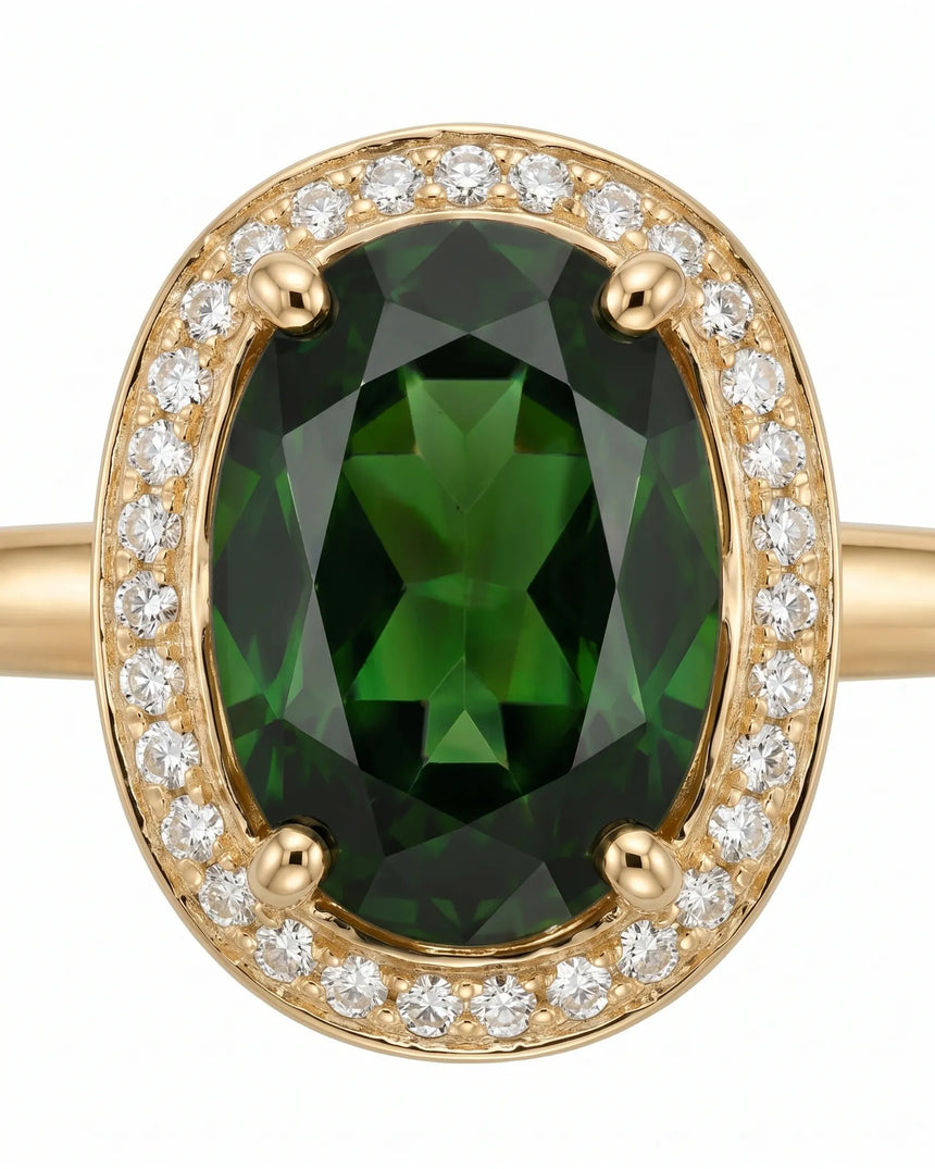 Luxury oval green tourmaline ring with diamond halo in 18K yellow gold | SARATTI
