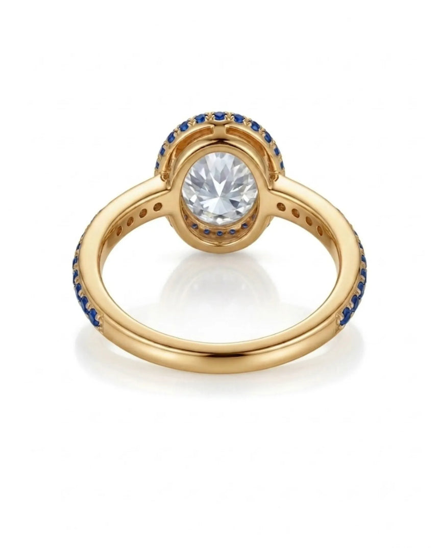 Luxury oval moissanite and natural sapphire ring with protective bezel in 18K yellow gold - SARATTI