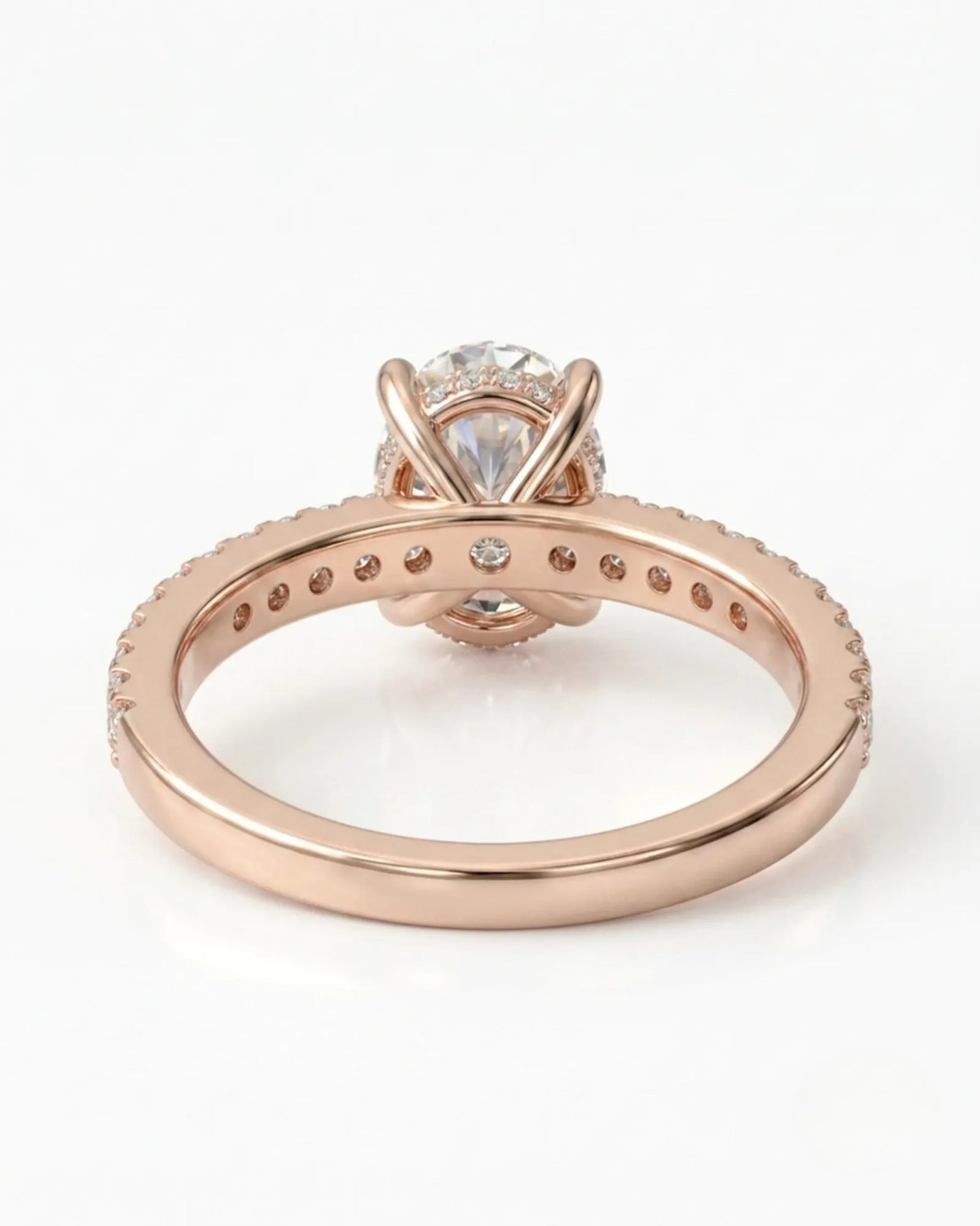 Luxury oval moissanite bridal set with matching pavé bands and refined 18K rose gold craftsmanship - SARATTI