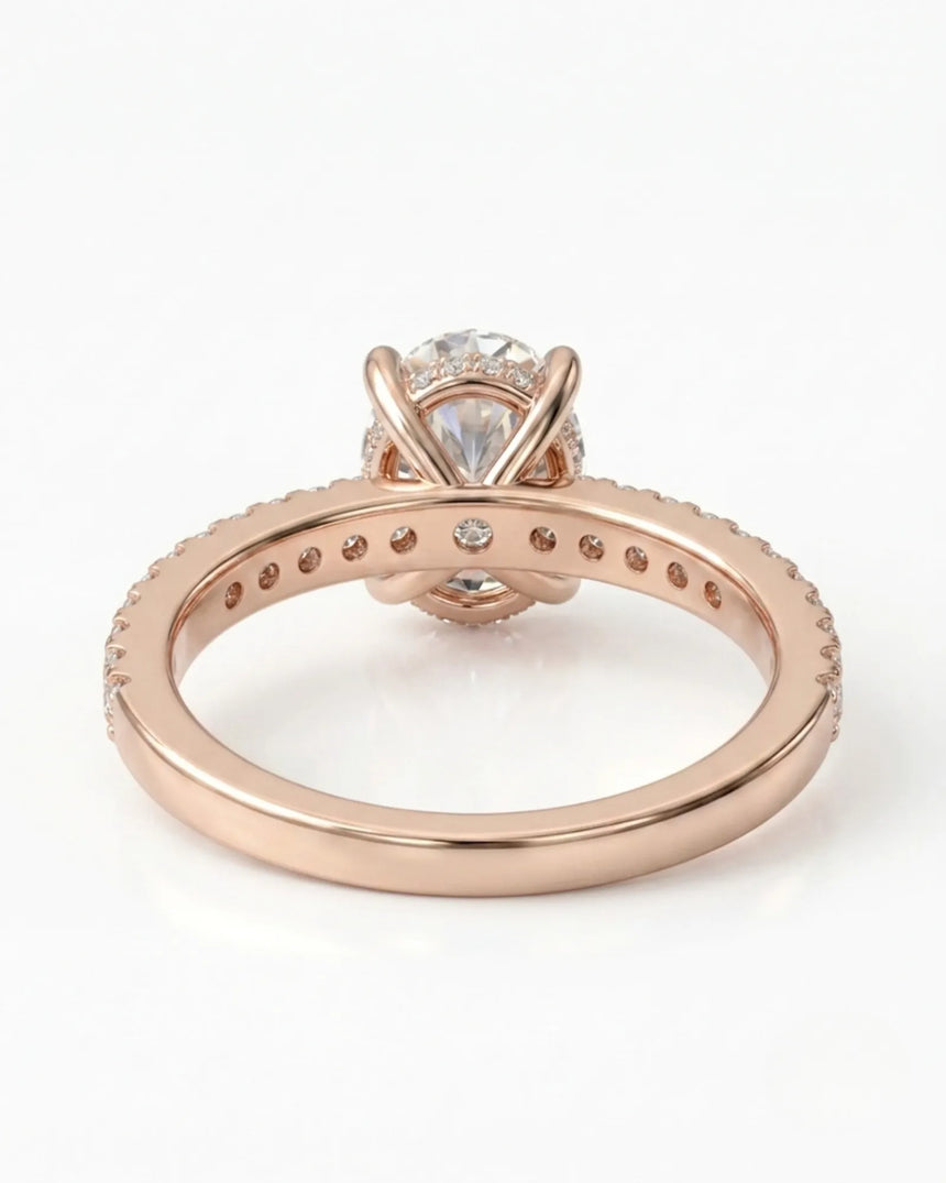Luxury oval moissanite bridal set with matching pavé bands and refined 18K rose gold craftsmanship - SARATTI