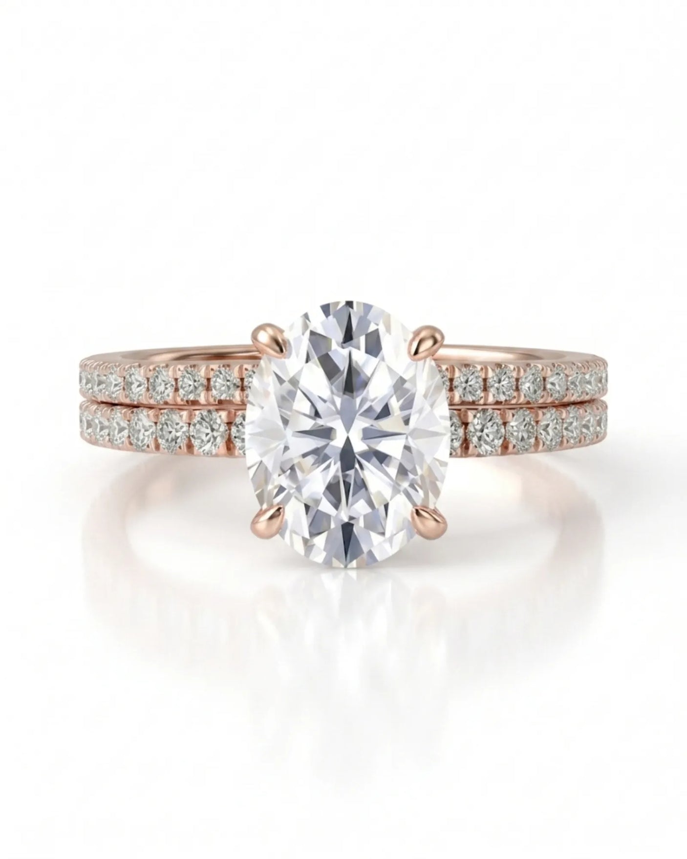 Luxury oval moissanite bridal set with matching pavé bands and refined 18K rose gold craftsmanship | SARATTI