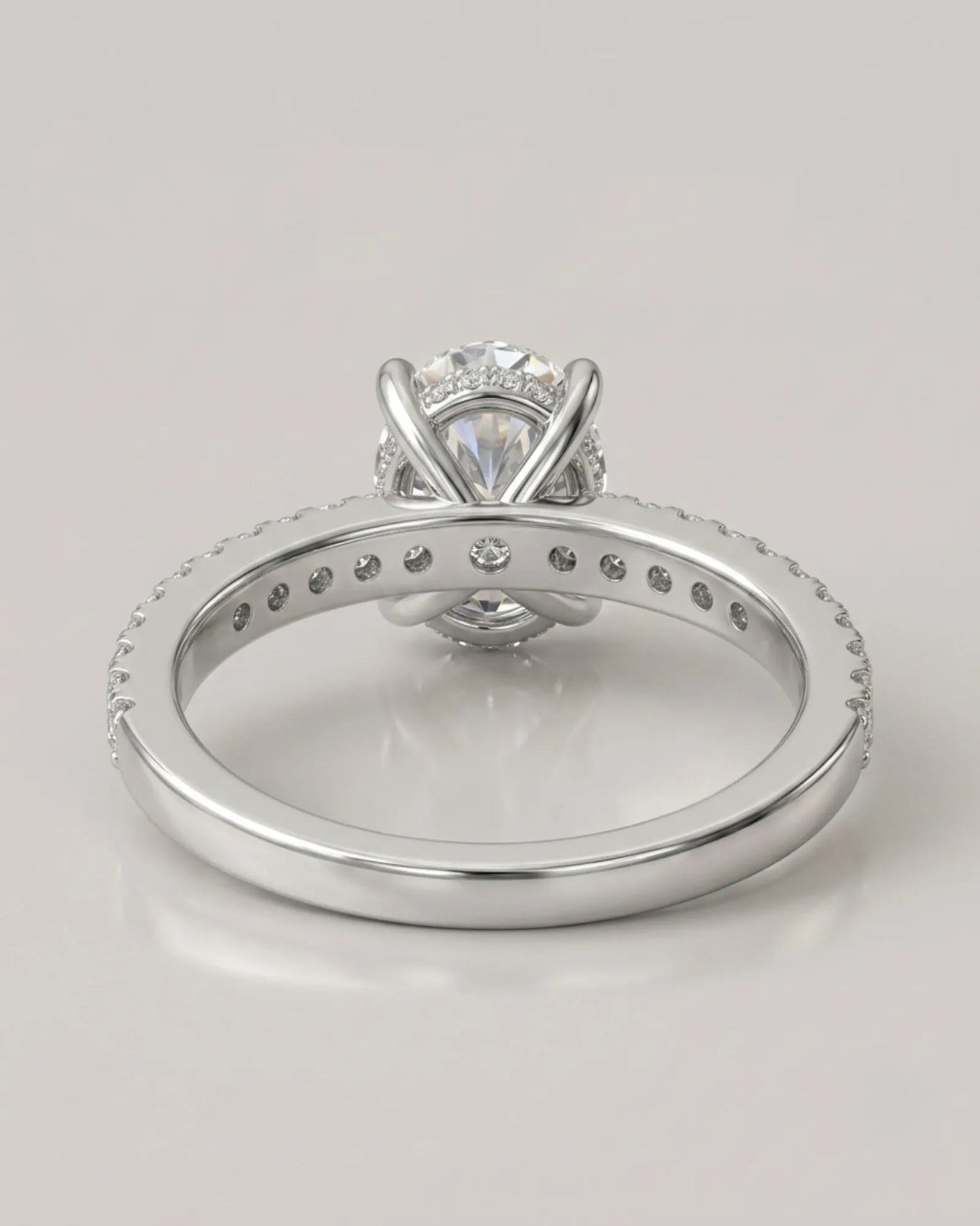 Luxury oval moissanite bridal set with matching pavé bands and refined 18K white gold craftsmanship - SARATTI