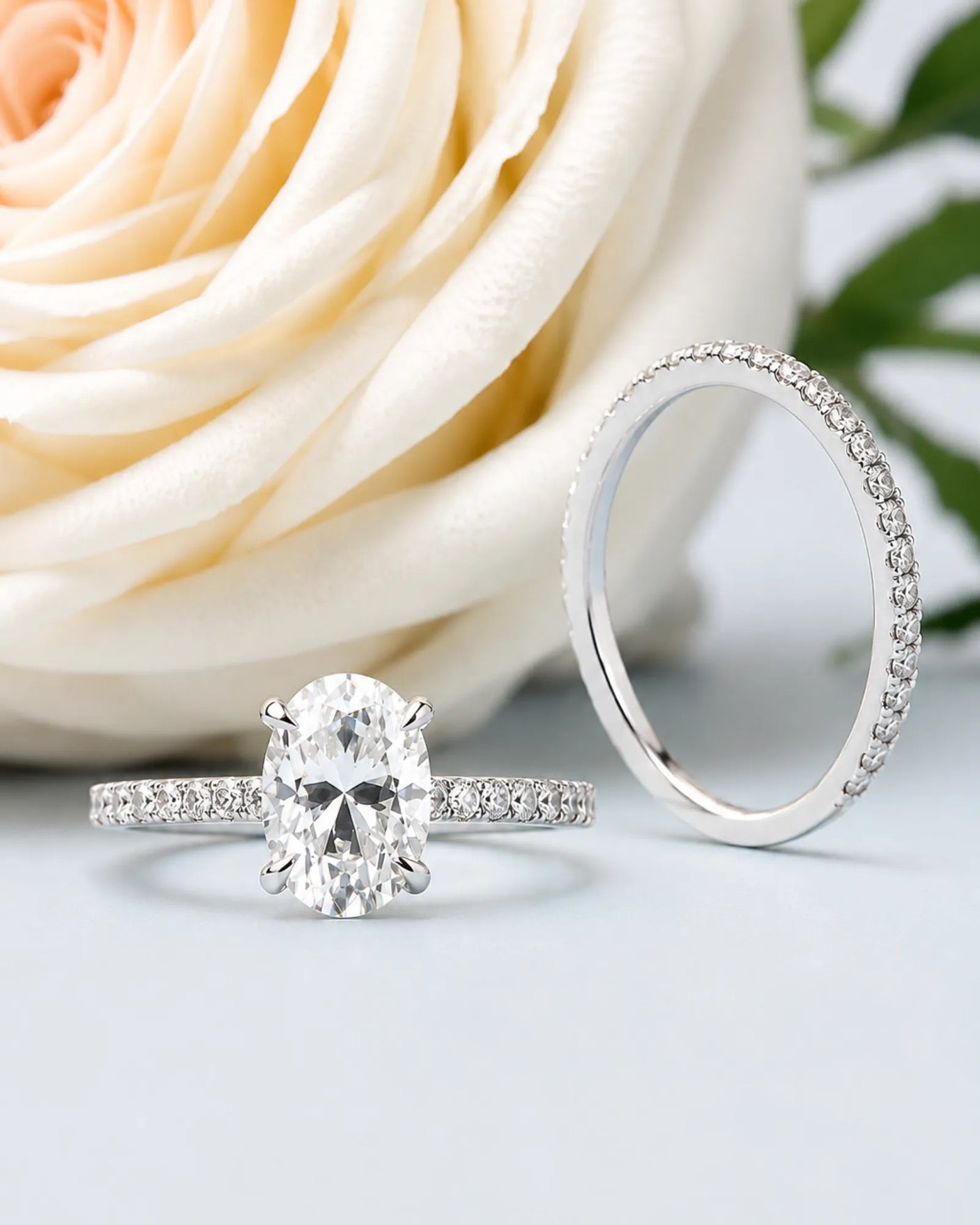 Luxury oval moissanite bridal set with matching pavé bands and refined 18K white gold craftsmanship | SARATTI