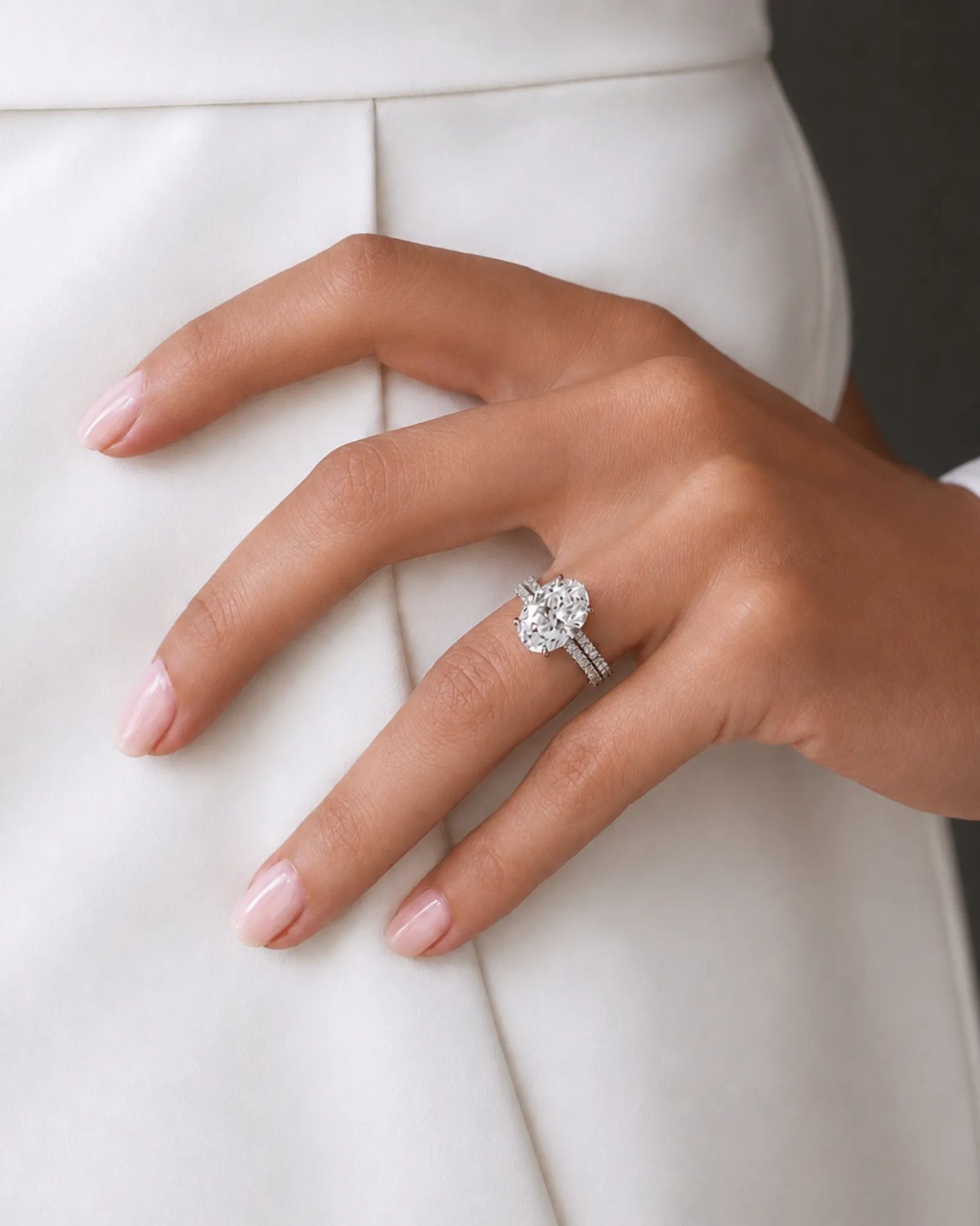 Luxury oval moissanite bridal set with matching pavé bands and refined platinum craftsmanship - SARATTI