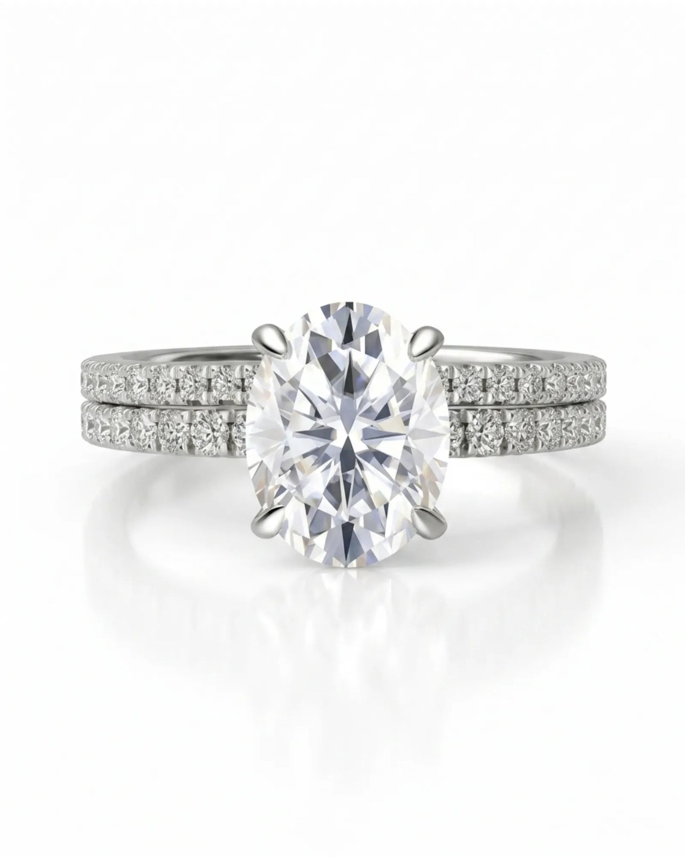 Luxury oval moissanite bridal set with matching pavé bands and refined platinum craftsmanship | SARATTI