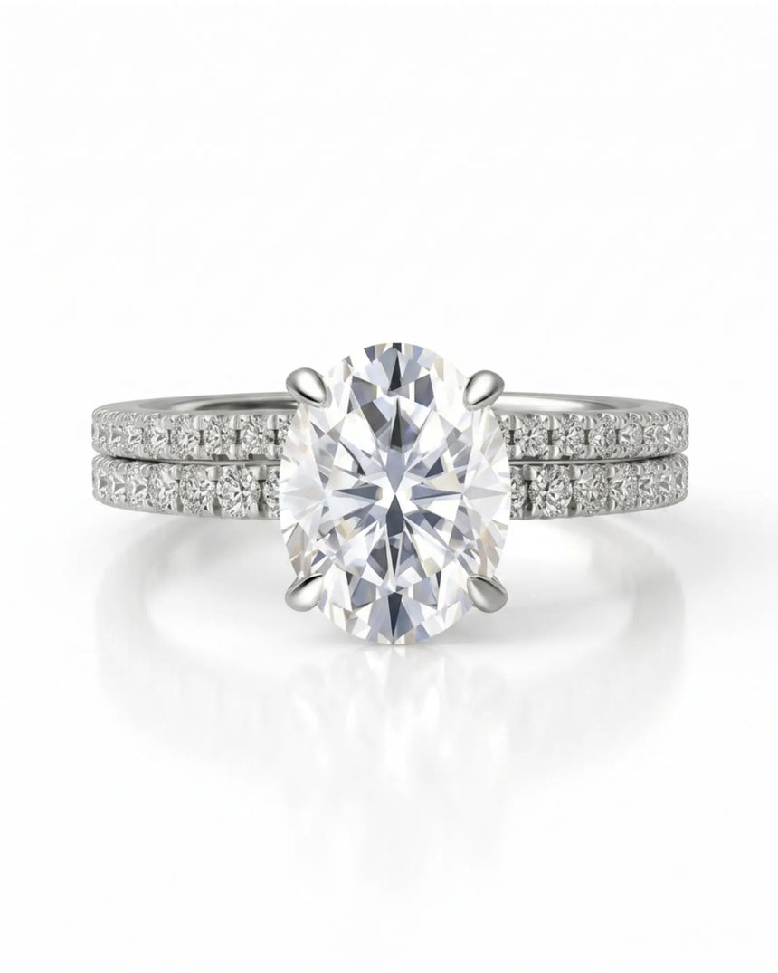 Luxury oval moissanite bridal set with matching pavé bands and refined platinum craftsmanship | SARATTI