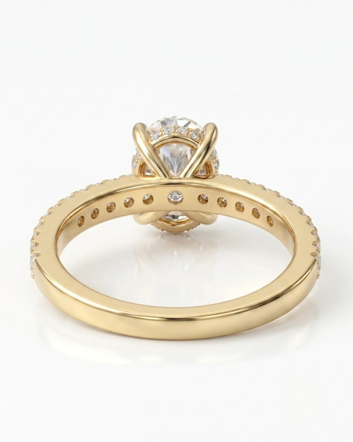 Luxury oval moissanite bridal set with matching pavé bands and rich 18K yellow gold craftsmanship - SARATTI