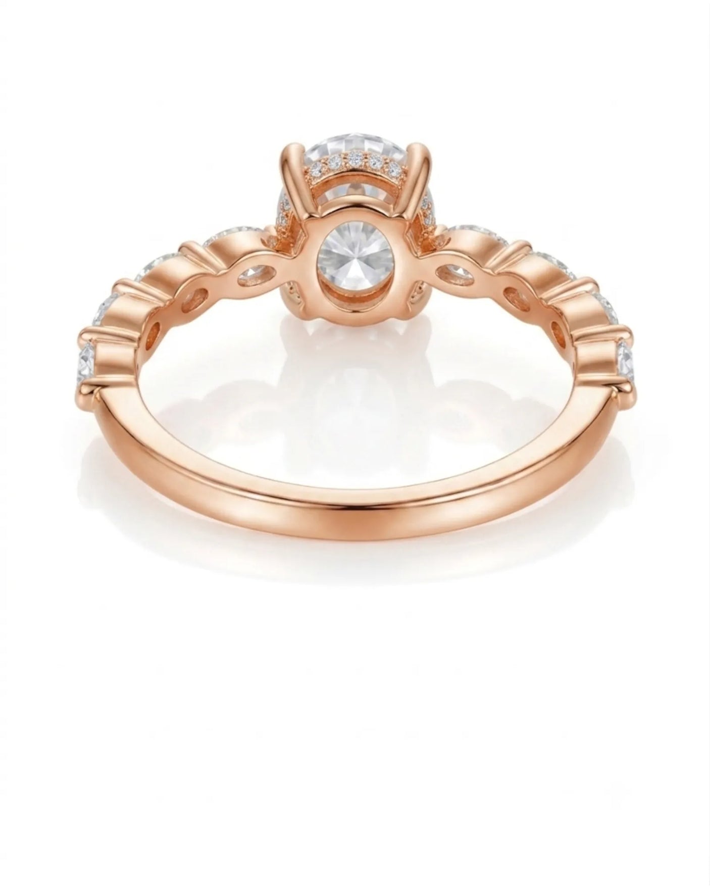 Luxury oval moissanite engagement ring with royal marquise detailing and 18K rose gold craftsmanship | SARATTI