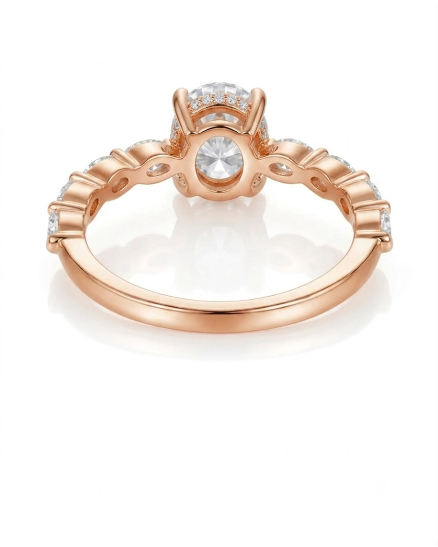 Luxury oval moissanite engagement ring with royal marquise detailing and 18K rose gold craftsmanship | SARATTI