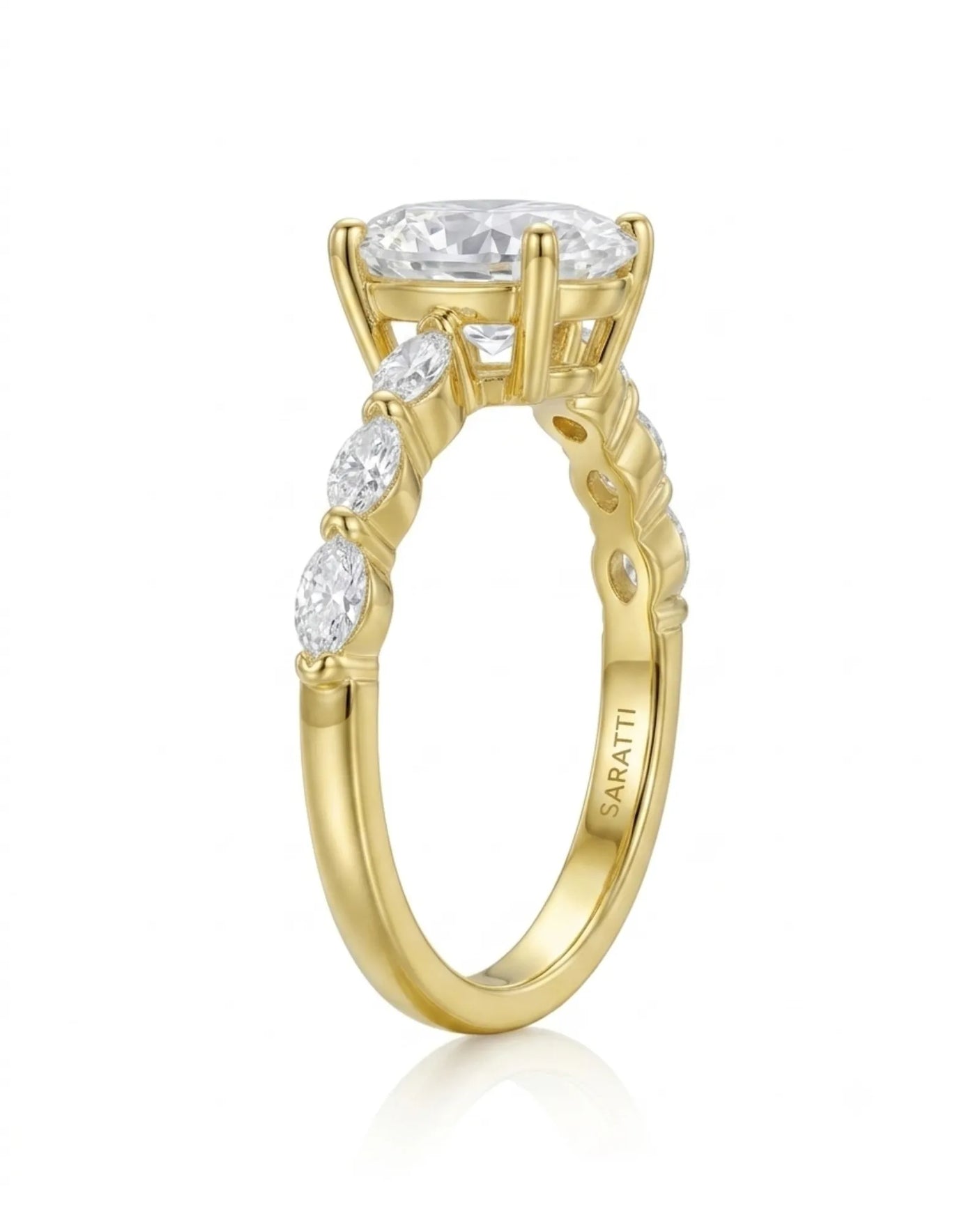 Luxury oval moissanite engagement ring with royal marquise detailing and 18K yellow gold craftsmanship -- SARATTI