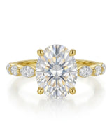 Luxury oval moissanite engagement ring with royal marquise detailing and 18K yellow gold craftsmanship - SARATTI