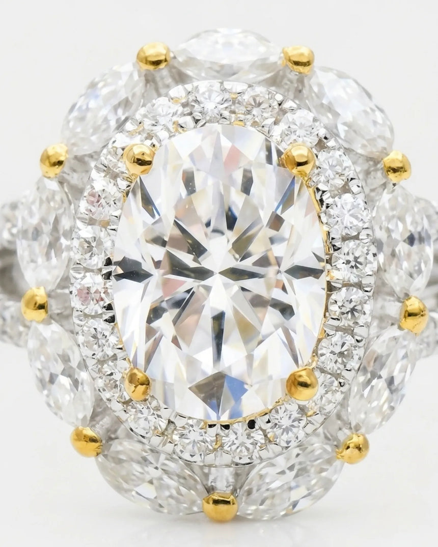 Luxury oval moissanite ring with floral halo and pavé split shan in two tone | SARATTI