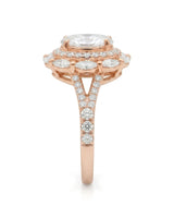 Luxury oval moissanite ring with floral halo and pavé split shank in rose gold | SARATTI
