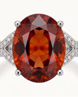 Luxury oval orange garnet ring with diamond accents in 18K white gold - SARATTI
